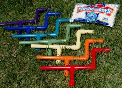 rainbow colored marshmallow shooter tubes with bag of marshmallows