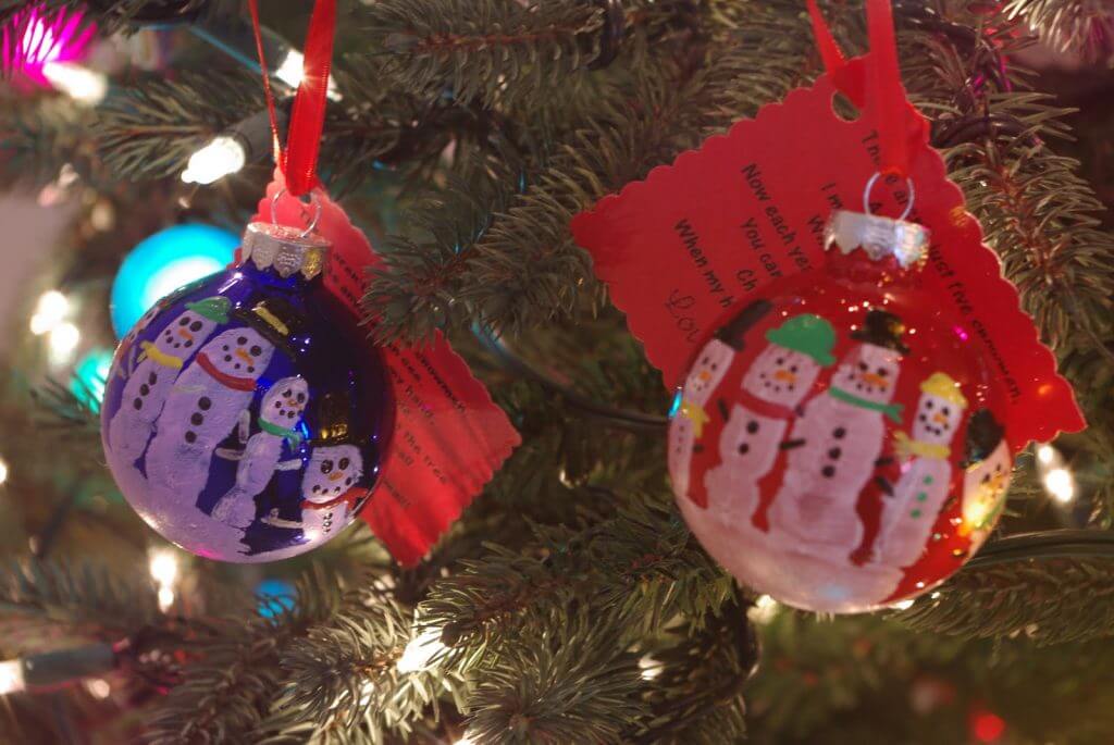 kid made ornaments hanging on tree