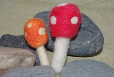 needle felted toadstools on rocks