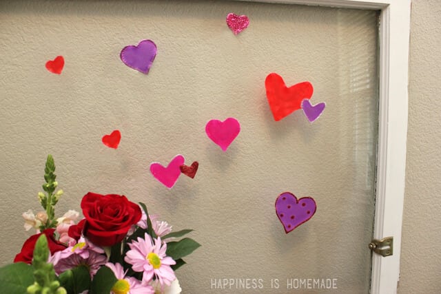 valentines heart shaped window clings made with elmer\'s glue