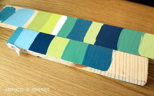 color swatches painted onto stir sticks