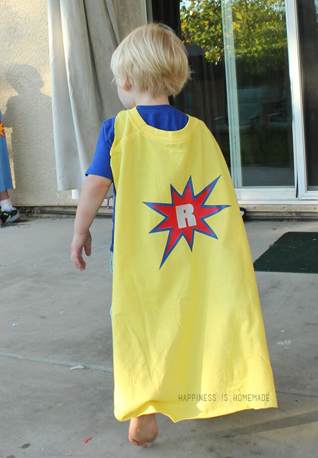 kid wearing diy super hero cape