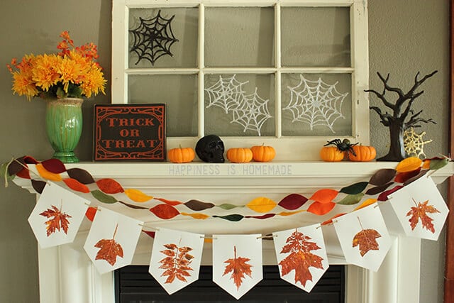 Glitter Glue Spiderwebs on Fall Halloween Mantel