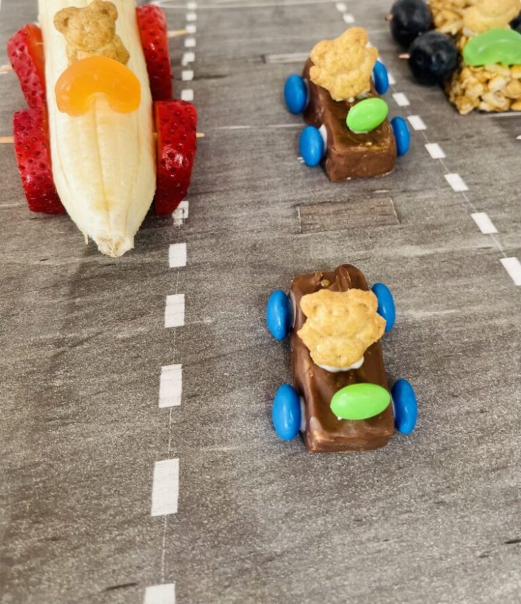 Rally racer kids snacks on road 