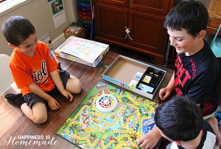 Boys Playing the Game of Life Game