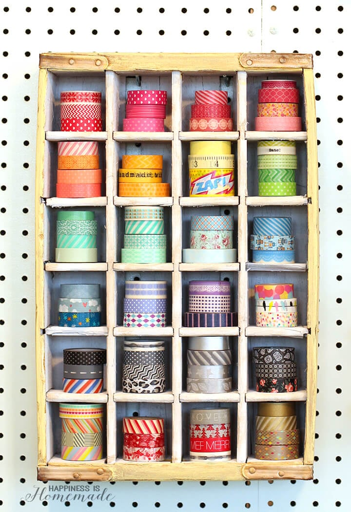 vintage soda crate used for washi tape storage 