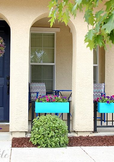 bright window box planters in entryway