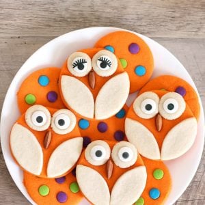 owl and polka dot halloween cookies on plate