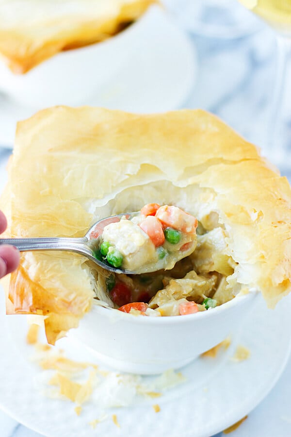 healthy chicken vegetable pot pie on spoon