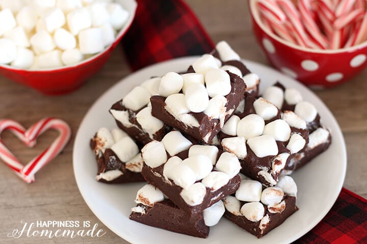 marshmallow fudge on platter with candy canes and marshmallows