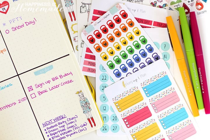 https://www.happinessishomemade.net/wp-content/uploads/2016/01/Bullet-Journal-with-Planner-Stickers-and-PaperMate-Flair-Pens.jpg