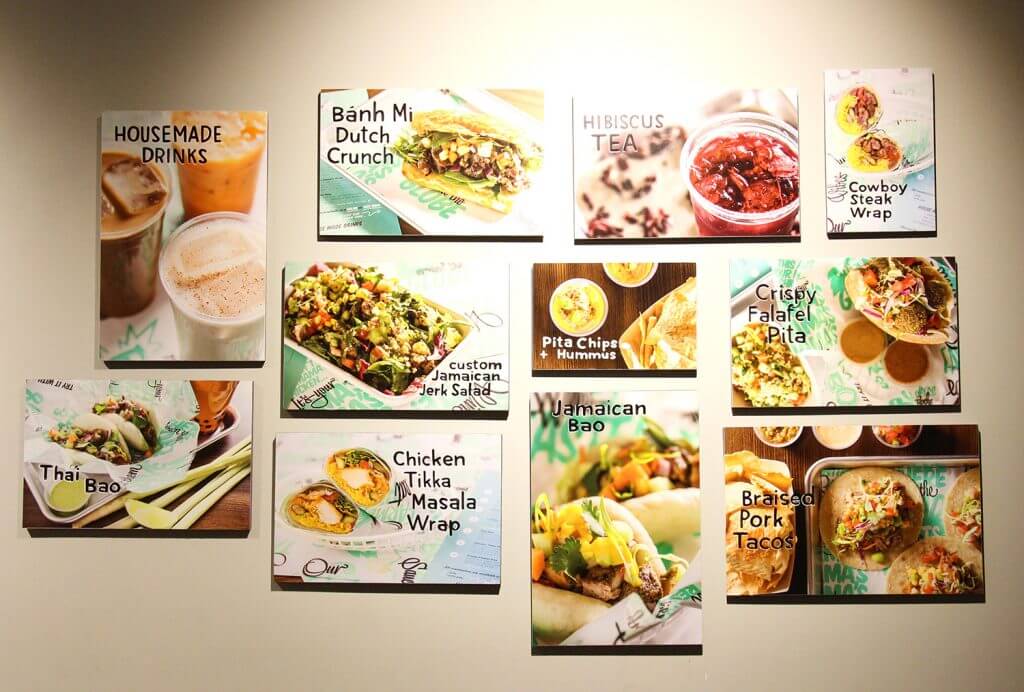 collage of heritage eats menu options hung on wall