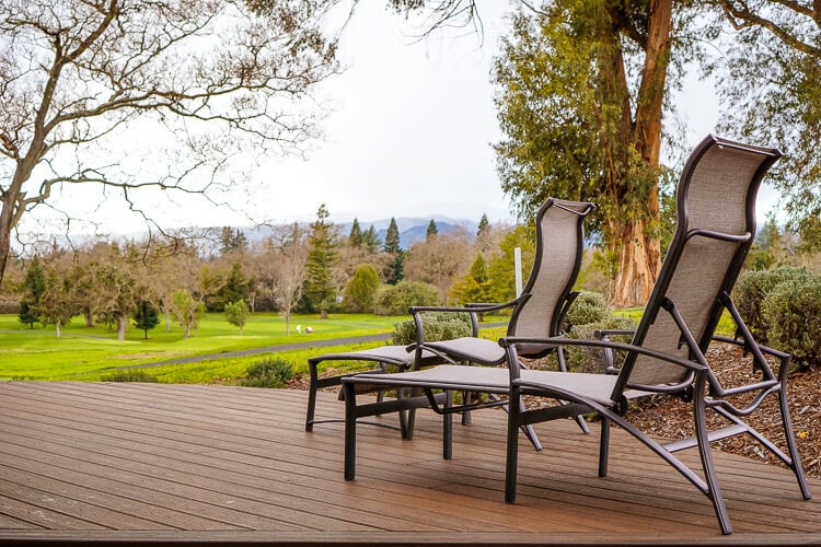 outdoor deck seats overlooking vineyard