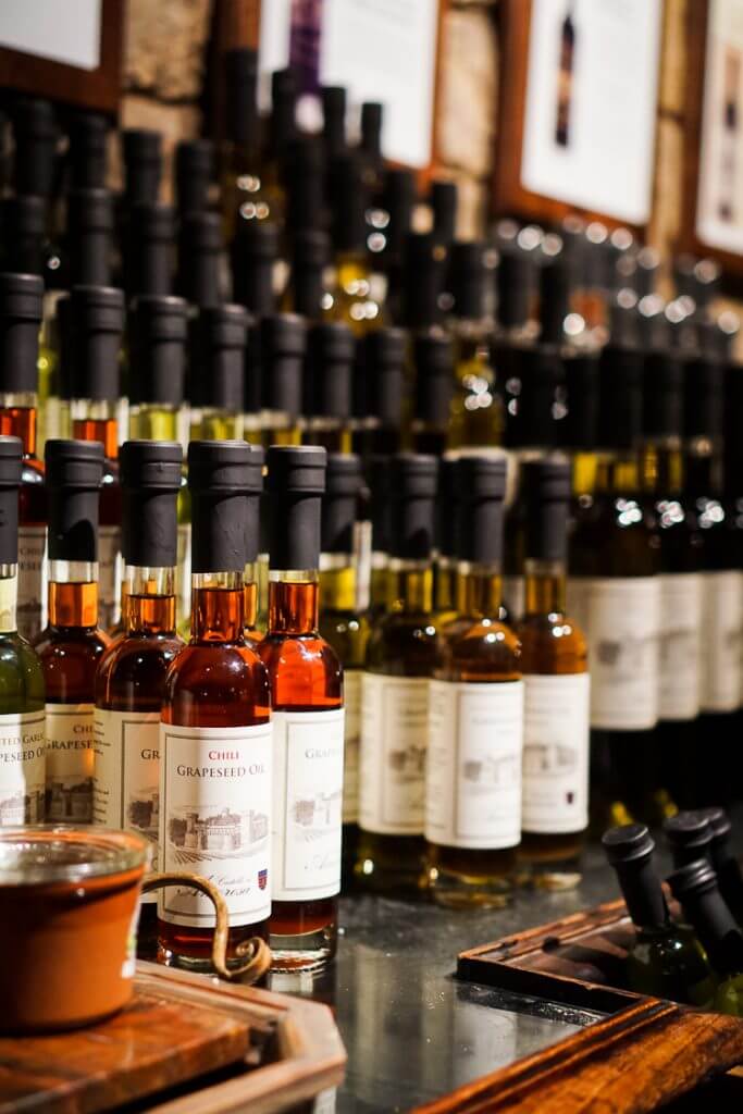 wine bottle selections lined up in cellar