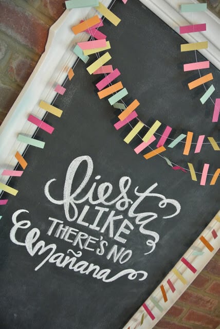 fiesta sign written on chalkboard