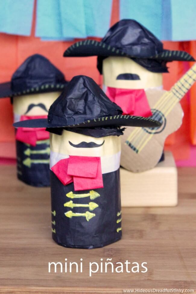 mini pinatas that look like mariachi band players