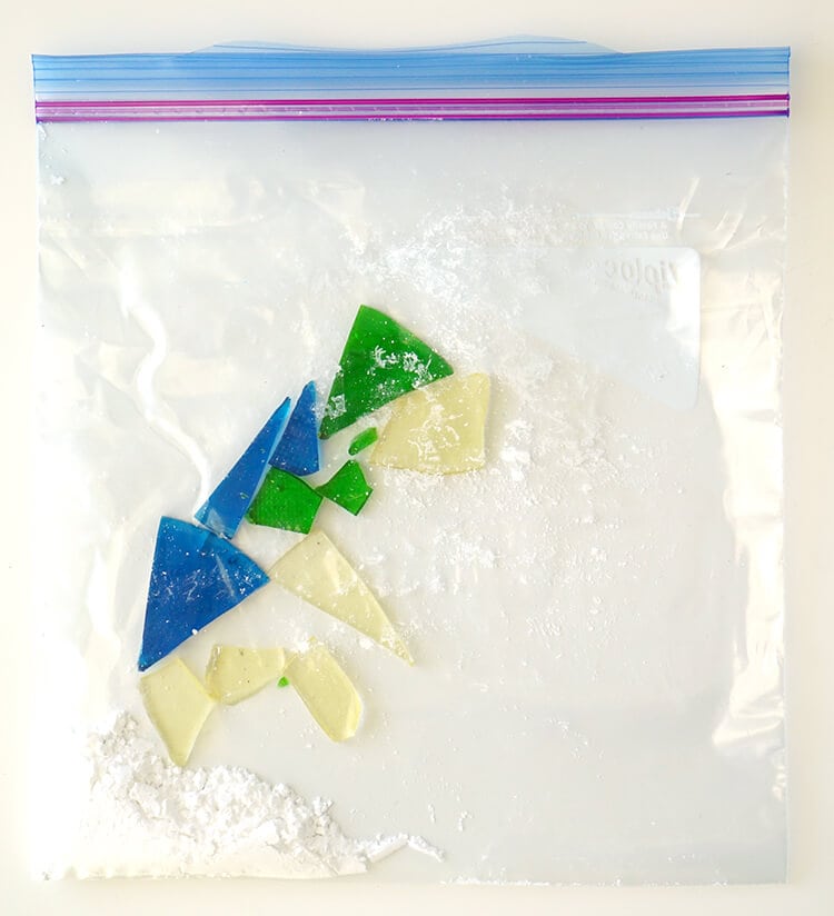 chunks of edible sea glass put into plastic ziploc bag