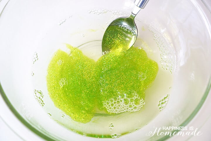 pretty glittery green slime mixture in bowl