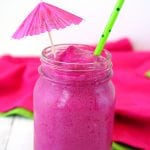 delicious watermelon dragon fruit smoothie with tropical umbrella garnish