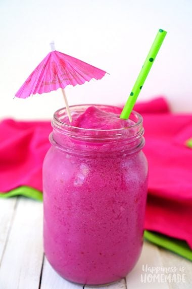 delicious watermelon dragon fruit smoothie with tropical umbrella garnish