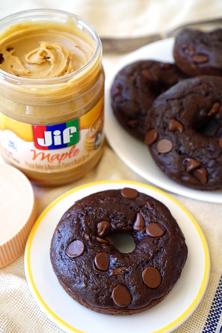 Top Double Chocolate Donuts with Maple Peanut Butter Jif Spread
