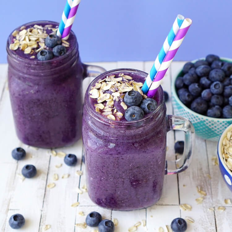blueberry muffin smoothies in mason jar mugs