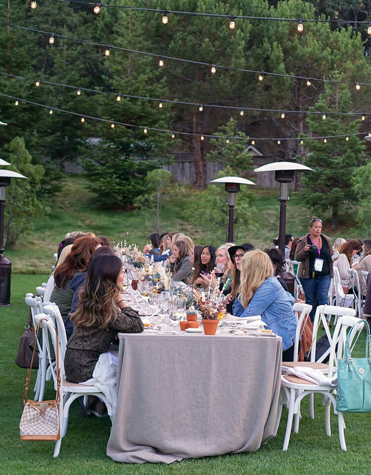 people dining outside at makers summit 