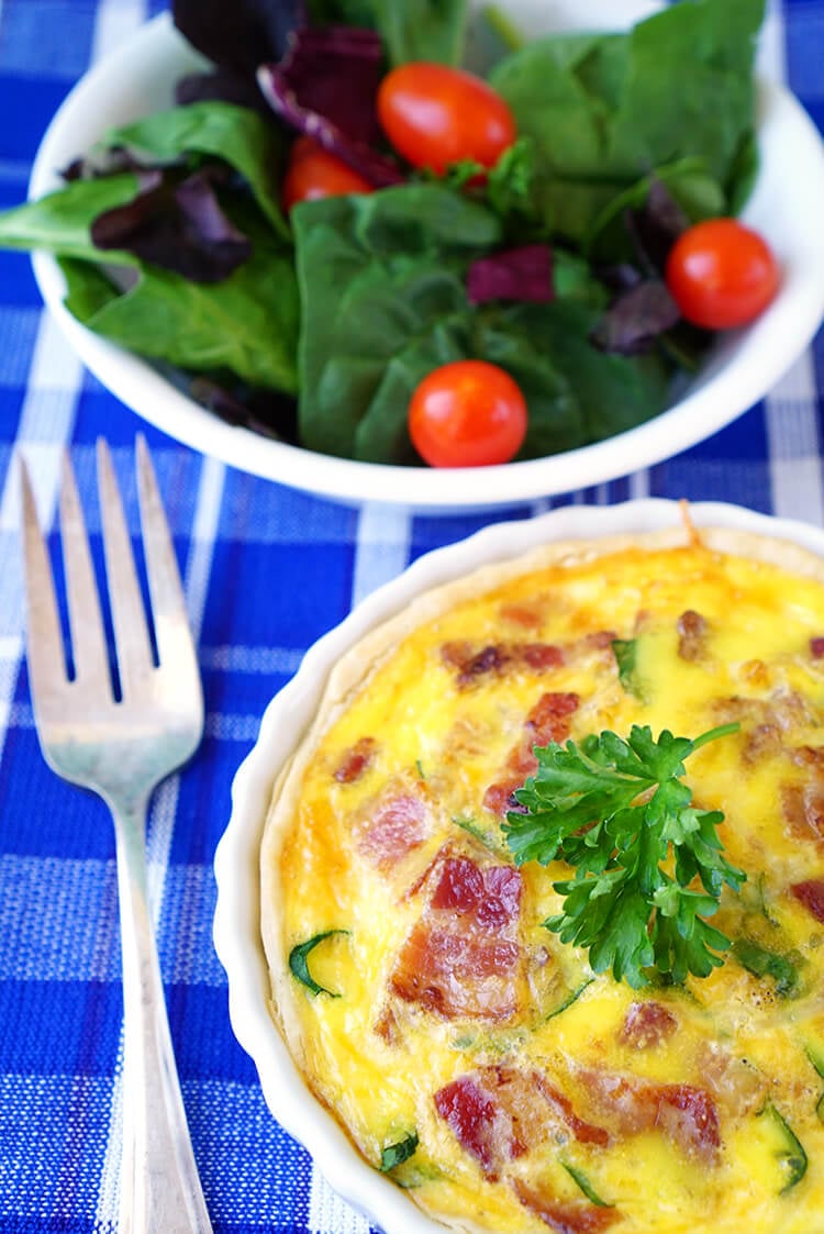 breakfast quiche bowl and side salad with fork