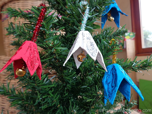 jingle bell ornaments hung on tree