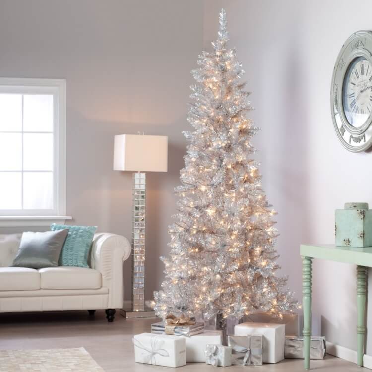 silver tinsel decorate christmas tree in home