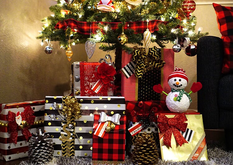 gorgeous holiday gift wrapped presents under tree