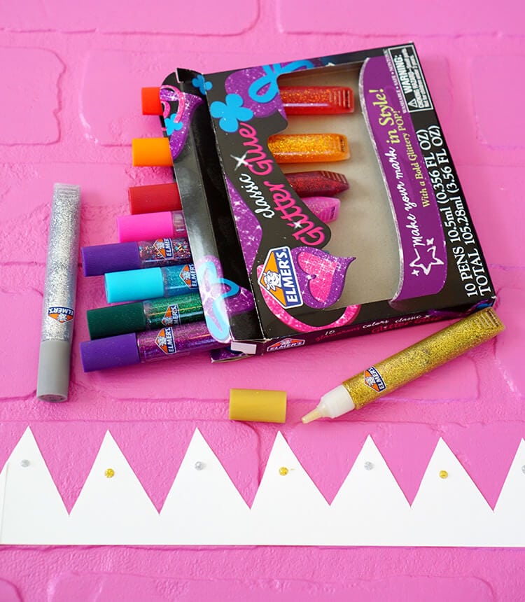 decorating new years eve confetti poppers with glitter glue