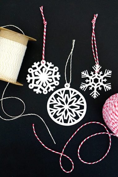 Shrinky dink snowflake ornaments and string