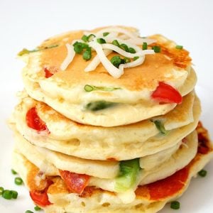 stack of pizza pancakes with chives