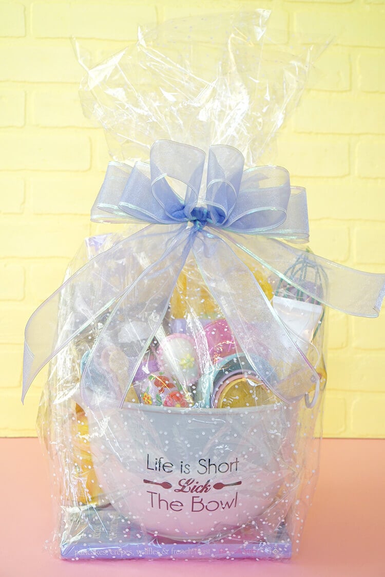 https://www.happinessishomemade.net/wp-content/uploads/2017/03/Cellophane-Wrapped-Easter-Baking-Gift-Basket.jpg