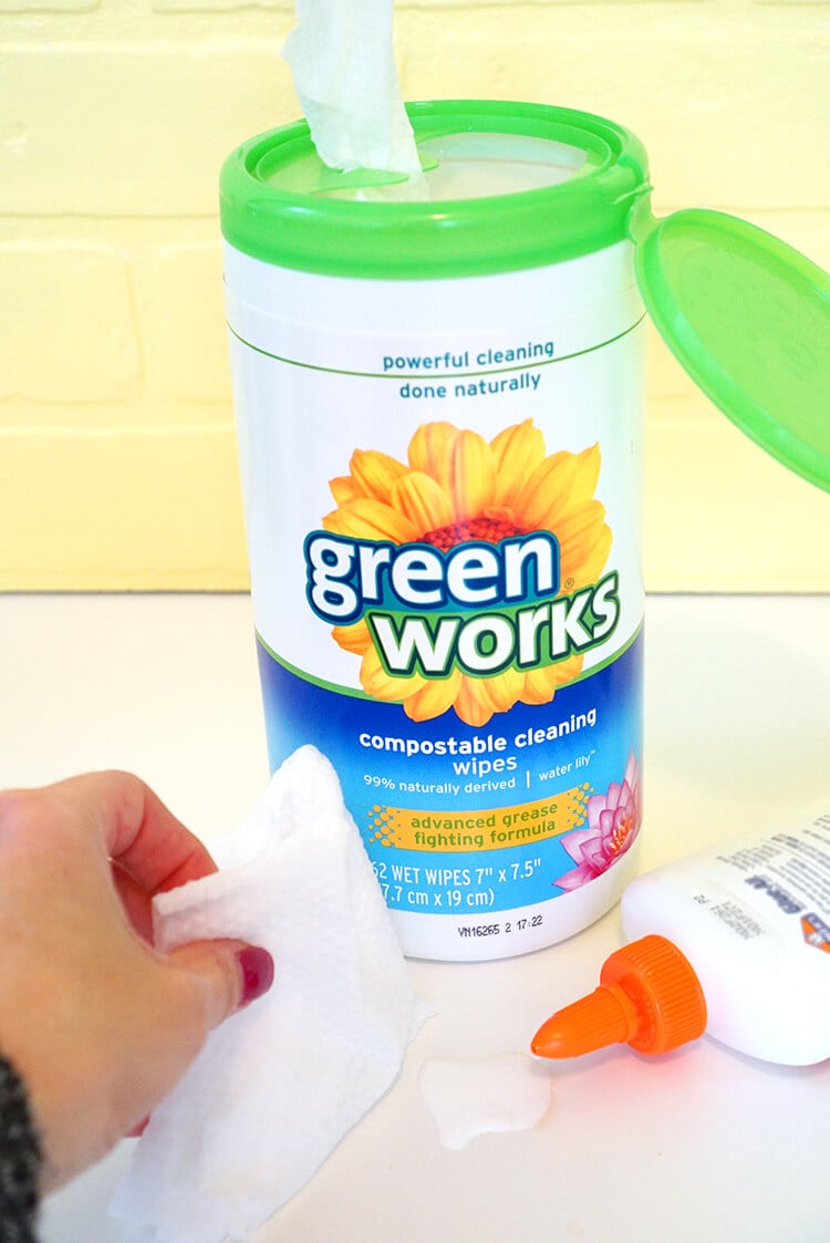 cleaning up mess with green works wipes 