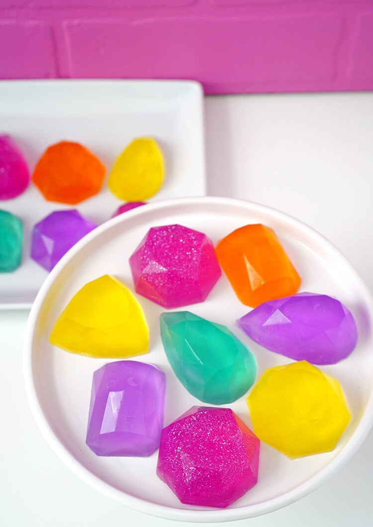 colorful platter of rainbow gemstone soaps