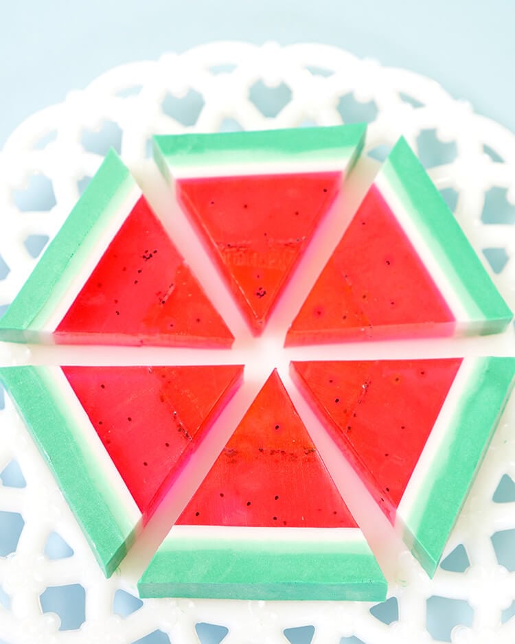DIY Watermelon Soap cut into triangles and arranged neatly on plate