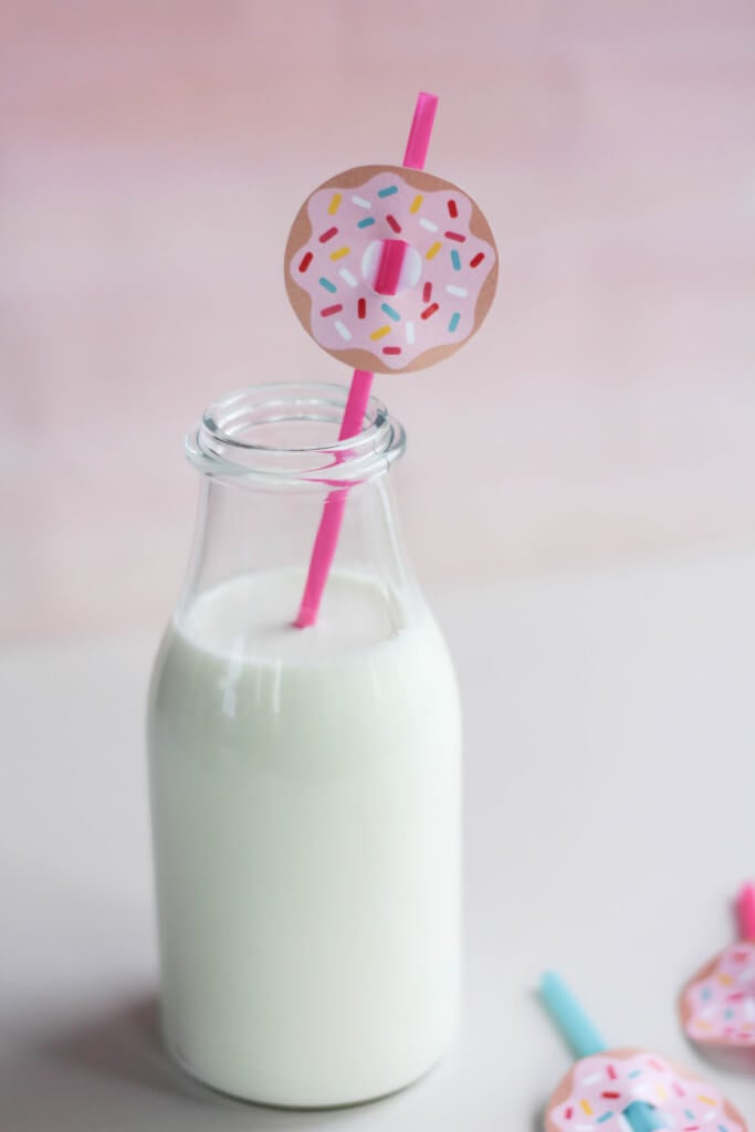 donut straw topper in glass of milk