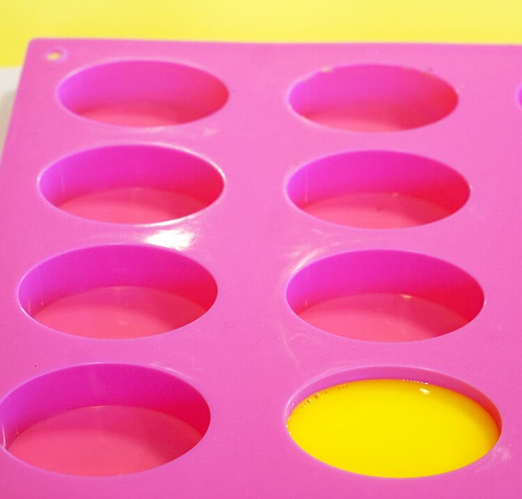 yellow portion of bat symbol poured into mold