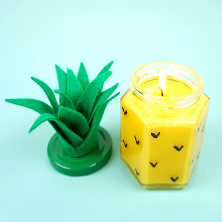 homemade pineapple gift with candle lit 