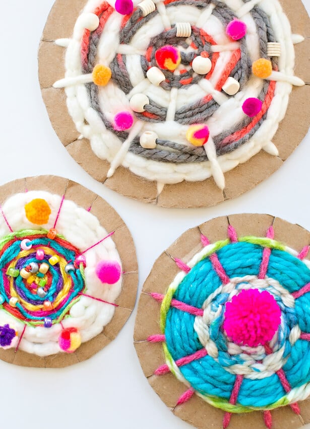 cardboard circle weaving looms with yarn started on them