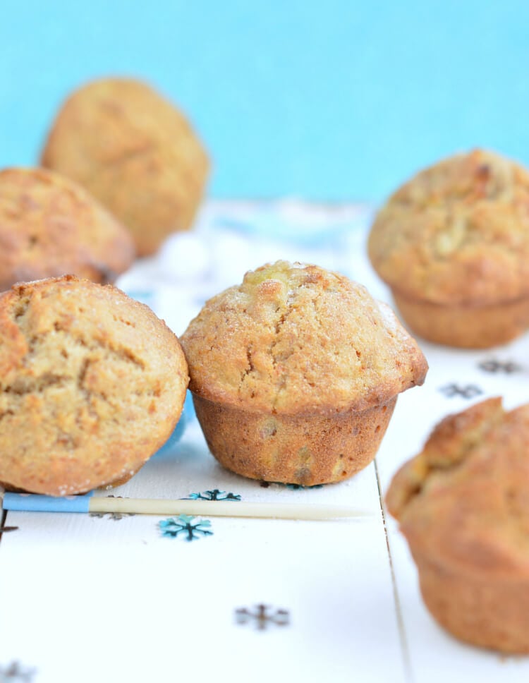 Healthy banana muffins on a white and blue background
