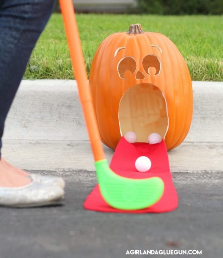 golfing balls into a pumpkin mouth