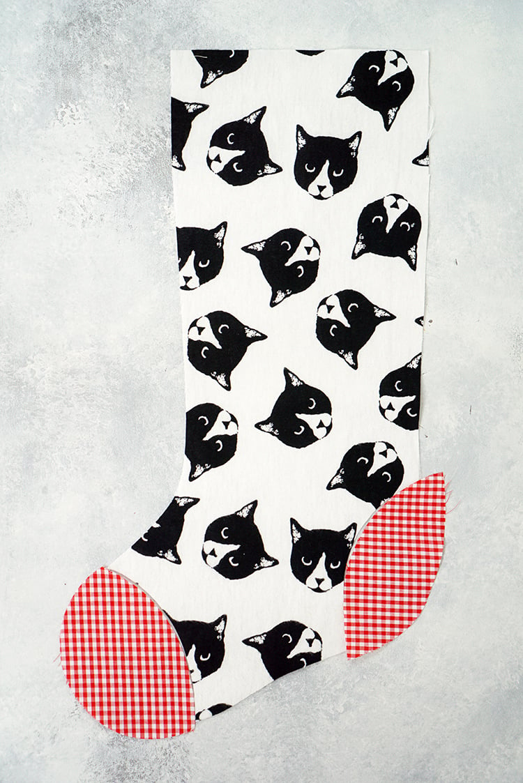 stocking fabrics assembled into cute diy kitty cat stocking
