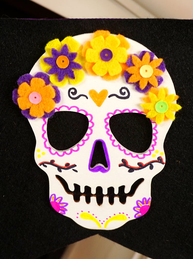 decorated skull to look like sugar skull for halloween banner