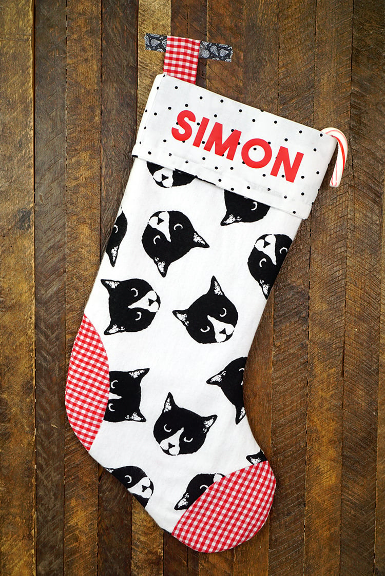 cute diy cat stocking that reads SIMON