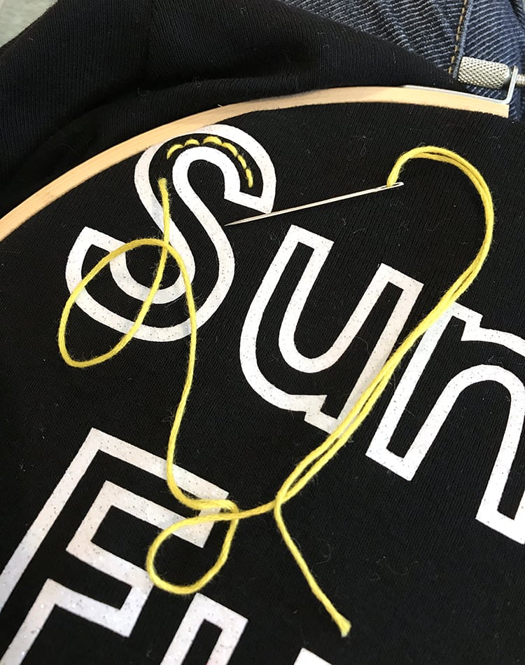 embroidering inside of letters of sunday funday