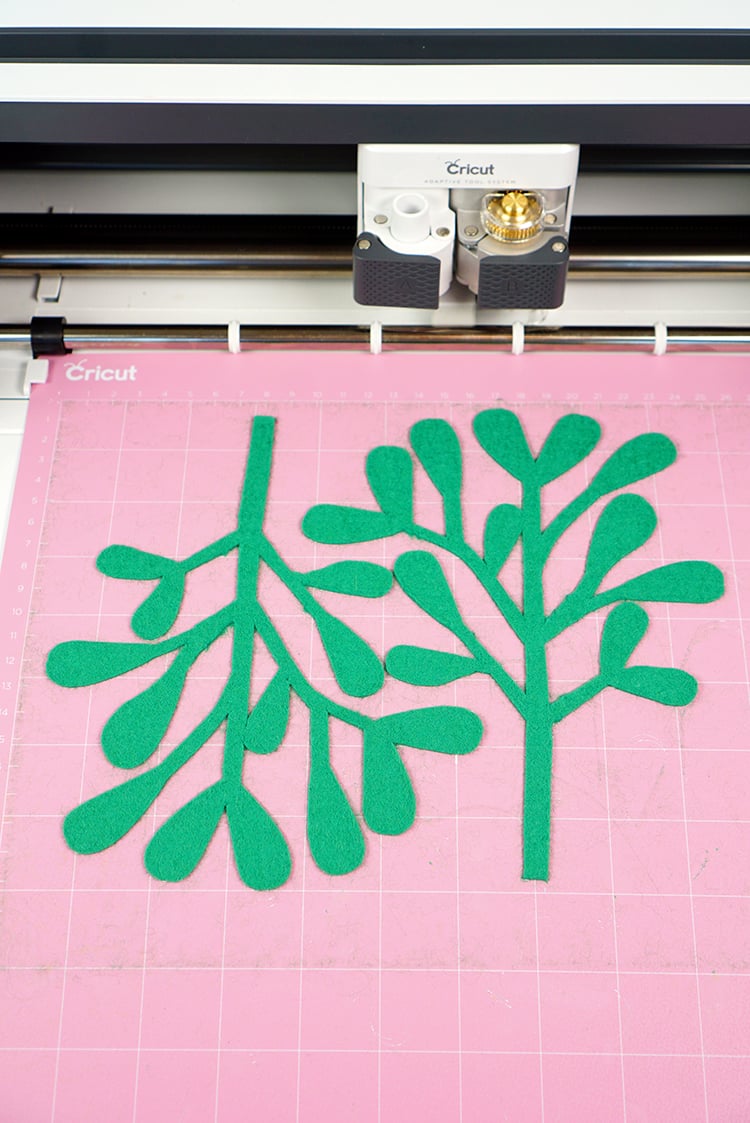 mistletoe pattern cut out on cricut cutting mat