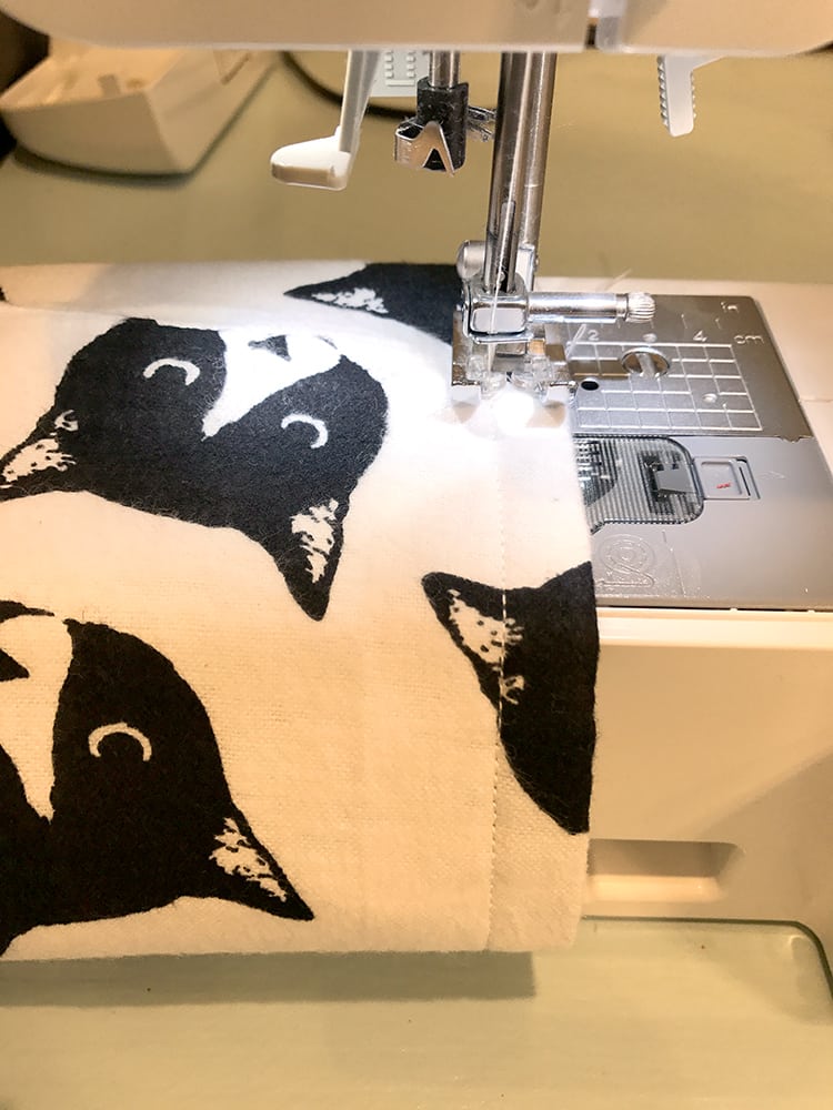 top stitching the stocking using sewing machine